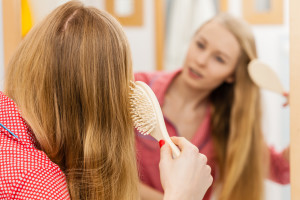 Woman Brushing Her Long Hair